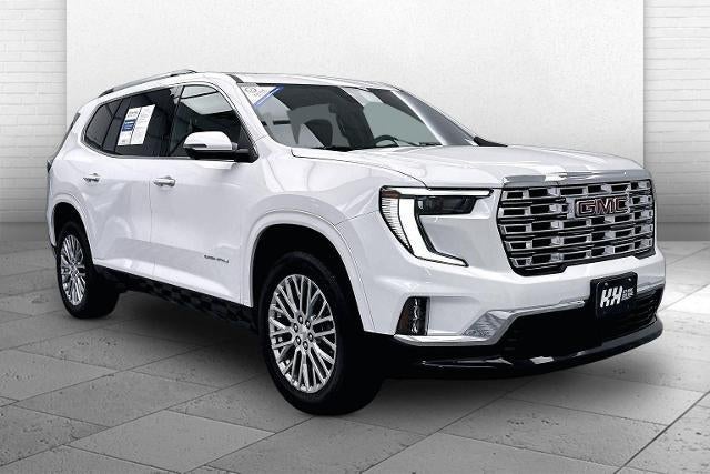 2025 GMC Acadia Denali in Summit White — front three-quarter view