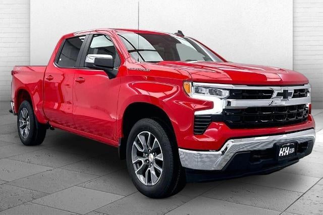 2026 Chevrolet Silverado 1500 LT in Red Hot — front three-quarter view