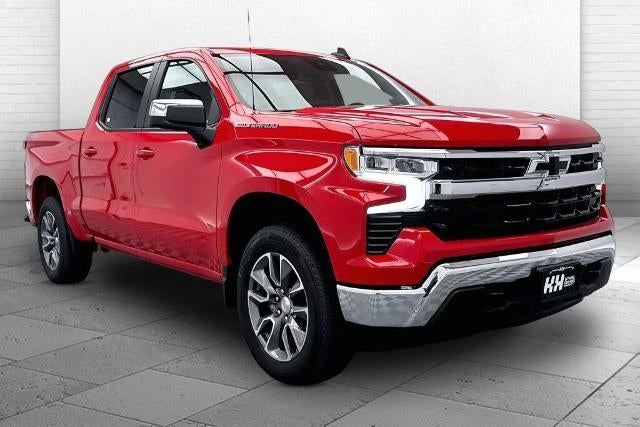2026 Chevrolet Silverado 1500 LT in Red Hot — front three-quarter view